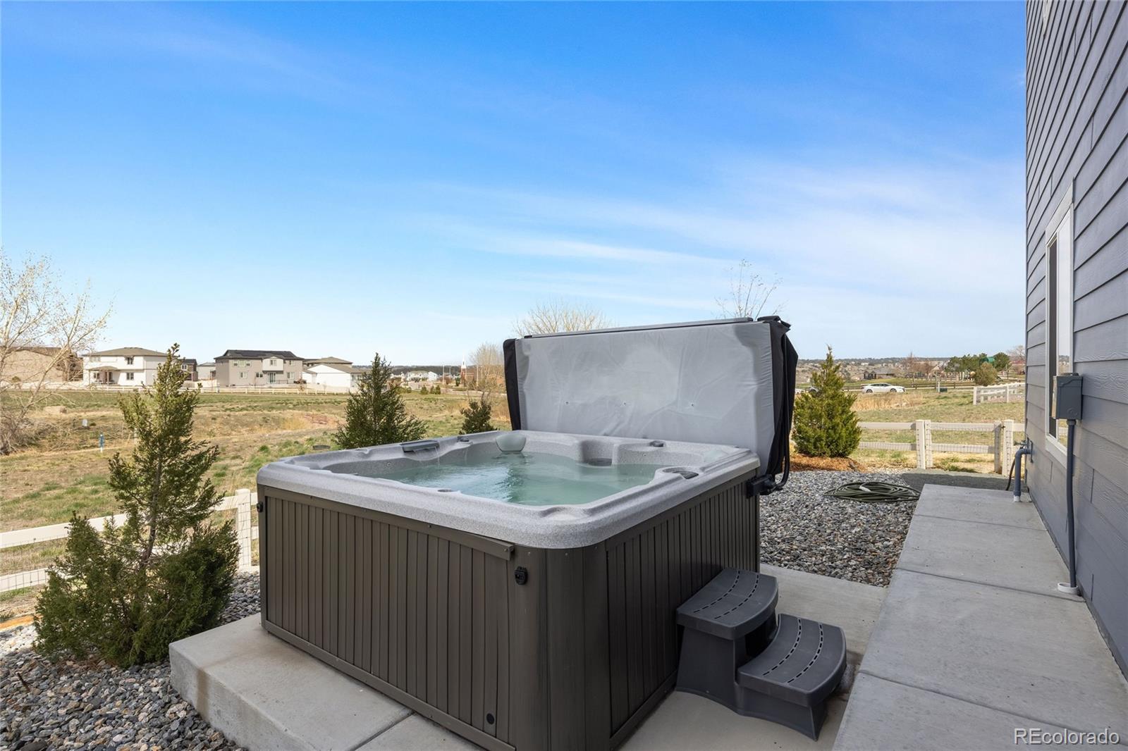 12649 Buffington Trail Parker, CO 80134 - Photo 37 of 47 a terrace with a table and chairs