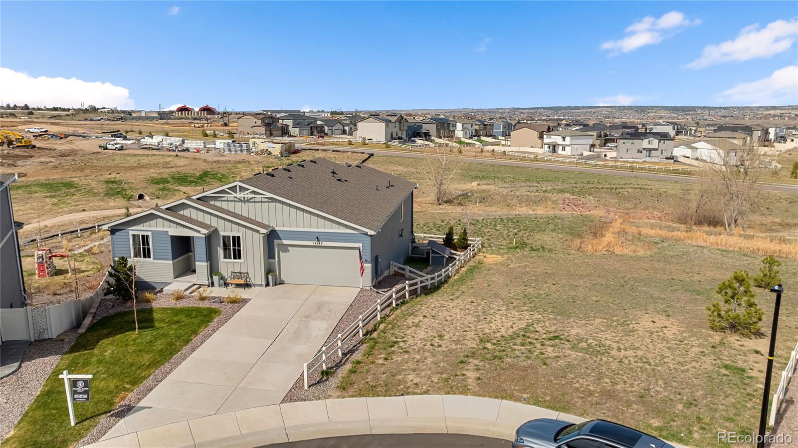 12649 Buffington Trail Parker, CO 80134 - Photo 39 of 47 a view of a city with an ocean view
