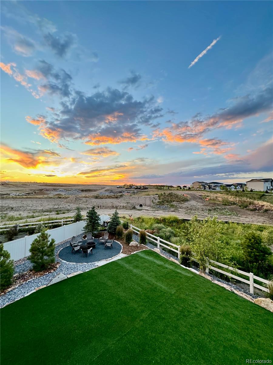 12649 Buffington Trail Parker, CO 80134 - Photo 42 of 47 a view of a garden and lake