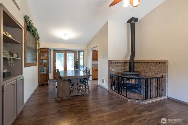 a view of a dining room with furniture window and wooden floor