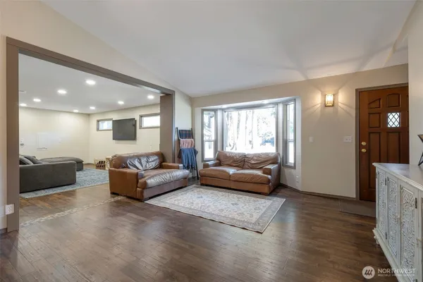 a living room with furniture and a couch