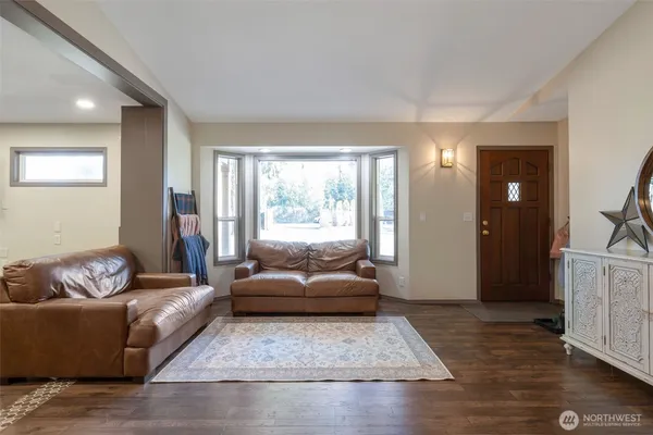 a living room with furniture and a couch