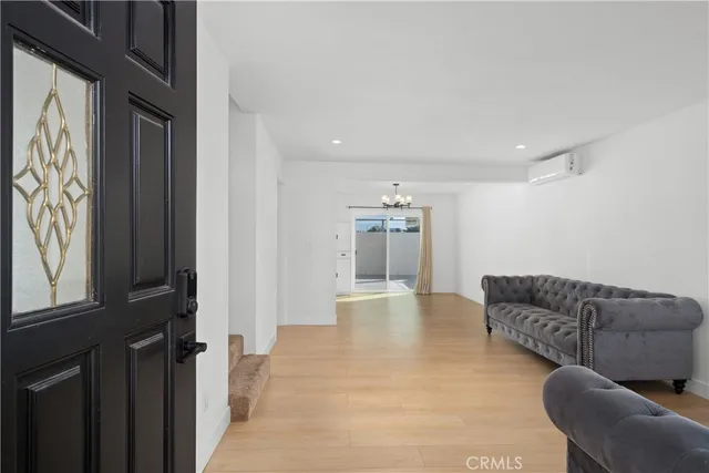 a living room with furniture and a couch