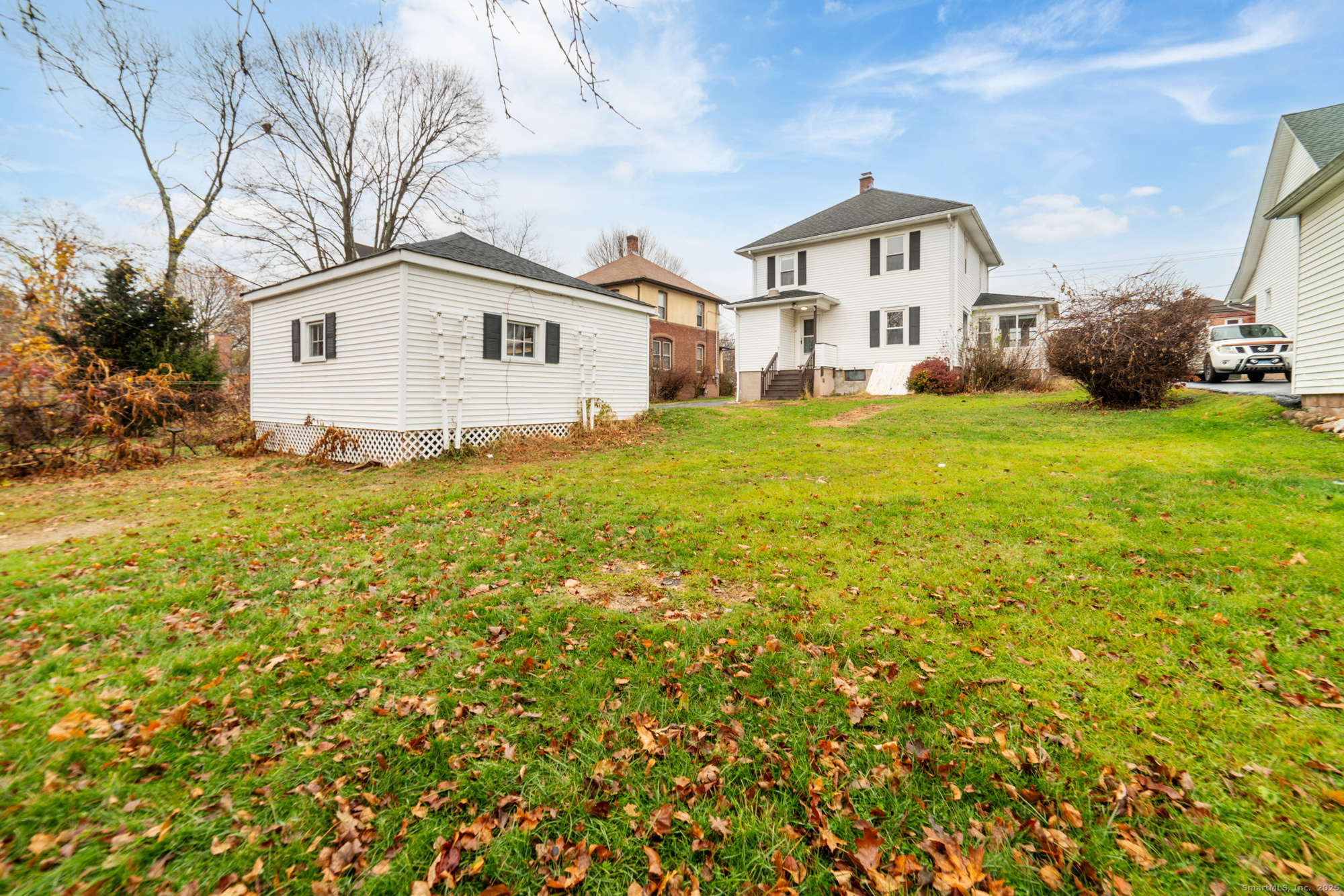 187 Ridge Road Middletown, CT 06457 - Photo 3 of 16 a view of a house with a yard