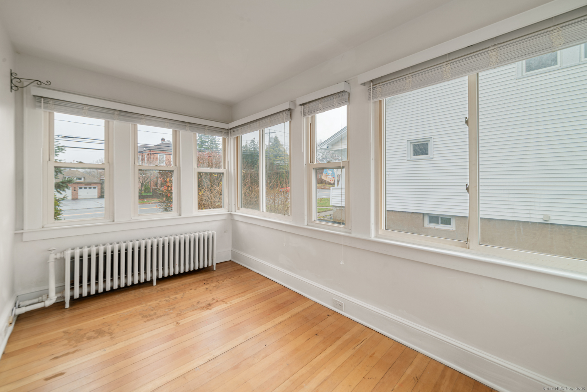 187 Ridge Road Middletown, CT 06457 - Photo 9 of 16 a view of an empty room with a window