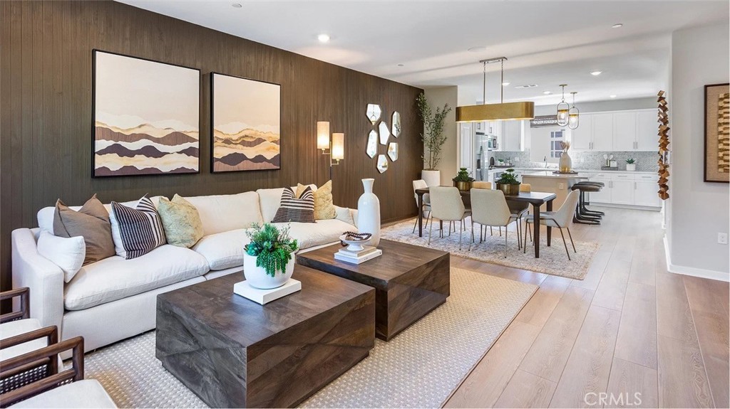 8397 Tapia Way Rancho Cucamonga, CA 91730 - Photo 1 of 22 a living room with furniture and a large window