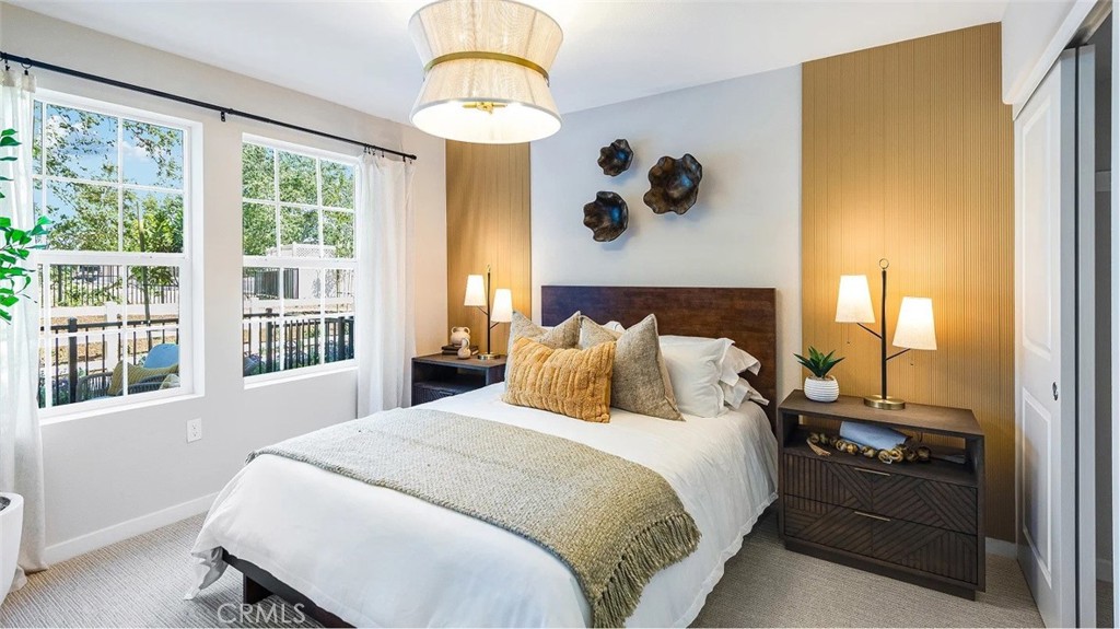 8397 Tapia Way Rancho Cucamonga, CA 91730 - Photo 11 of 22 a bedroom with a bed and a painting on the wall