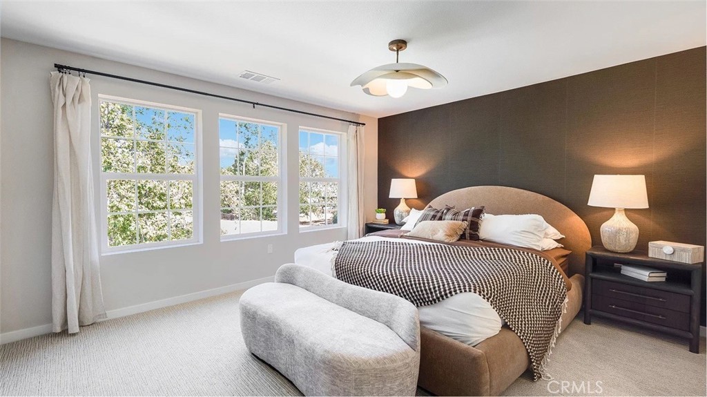 8397 Tapia Way Rancho Cucamonga, CA 91730 - Photo 14 of 22 a bedroom with bed and window