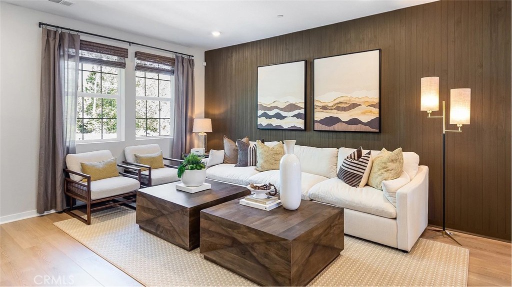 8397 Tapia Way Rancho Cucamonga, CA 91730 - Photo 6 of 22 a living room with furniture and a large window