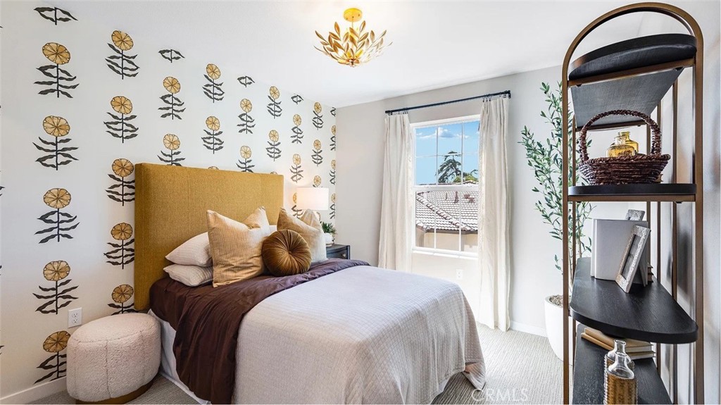 8397 Tapia Way Rancho Cucamonga, CA 91730 - Photo 9 of 22 a bedroom with a bed and a painting on the wall