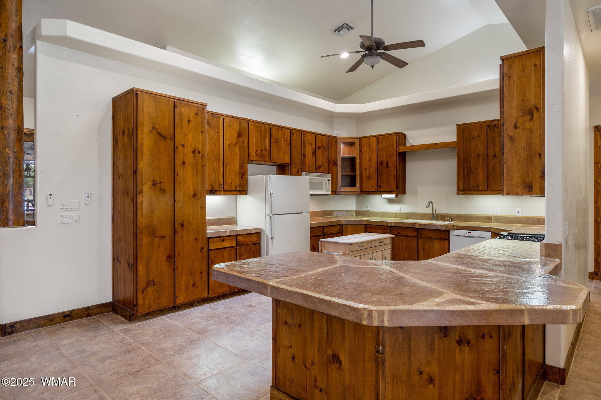 1955 Ricochet Ranch Road Show Low, AZ 85901 - Photo 14 of 43 a kitchen with stainless steel appliances granite countertop a sink a stove and a refrigerator