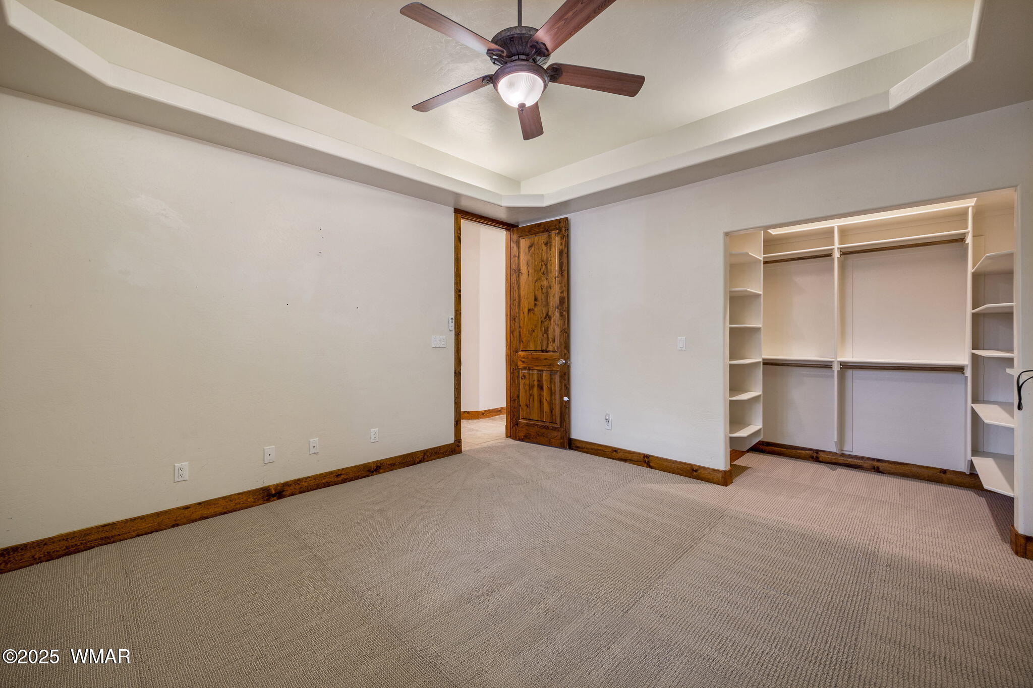 1955 Ricochet Ranch Road Show Low, AZ 85901 - Photo 21 of 43 a view of an empty room with a ceiling fan