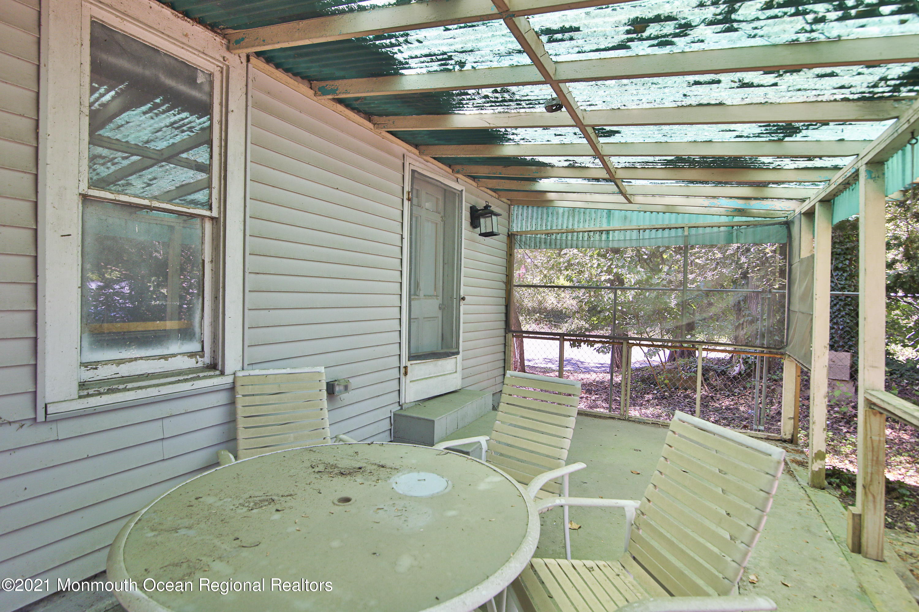 61 Cassville Road Jackson, NJ 08527 - Photo 22 of 26 a view of a swimming pool with outdoor seating