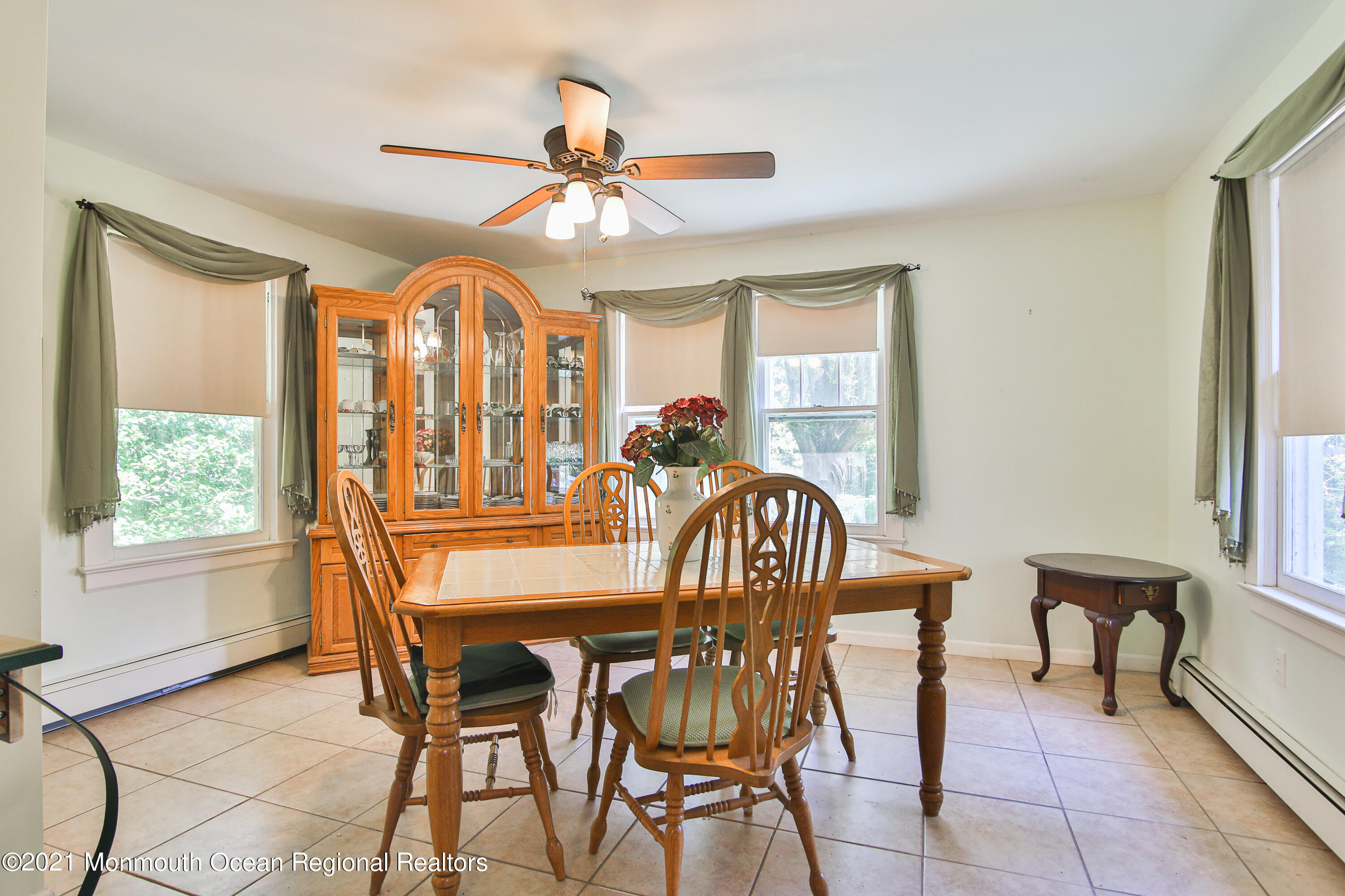 61 Cassville Road Jackson, NJ 08527 - Photo 8 of 26 a view of a dining room with furniture and a chandelier
