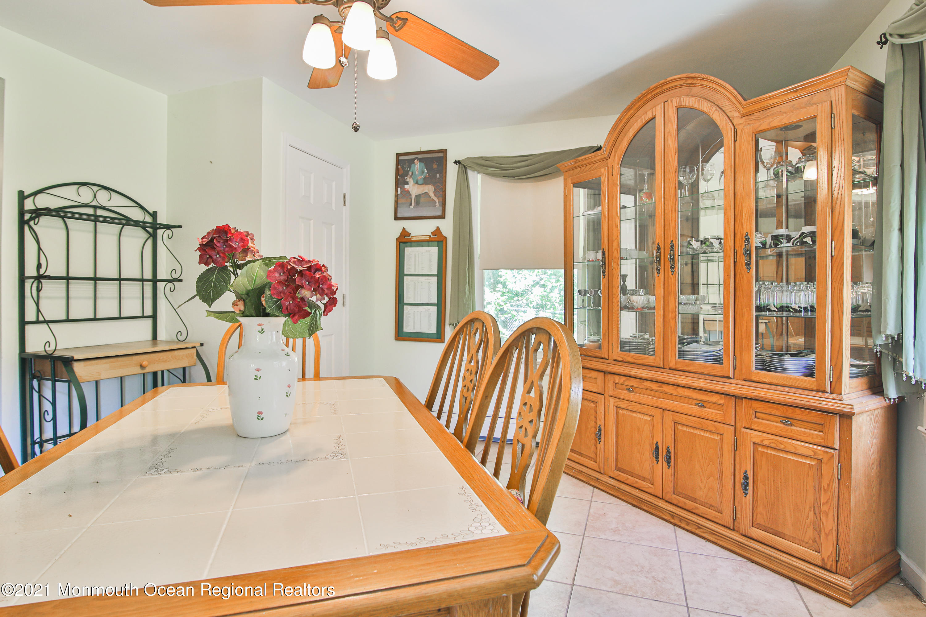 61 Cassville Road Jackson, NJ 08527 - Photo 10 of 26 a view of a dining room with furniture window and wooden floor