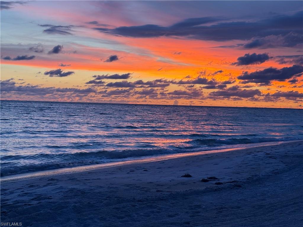 4160 Crayton Road, Unit A4 Naples, FL 34103 - Photo 21 of 23 a view of an ocean beach