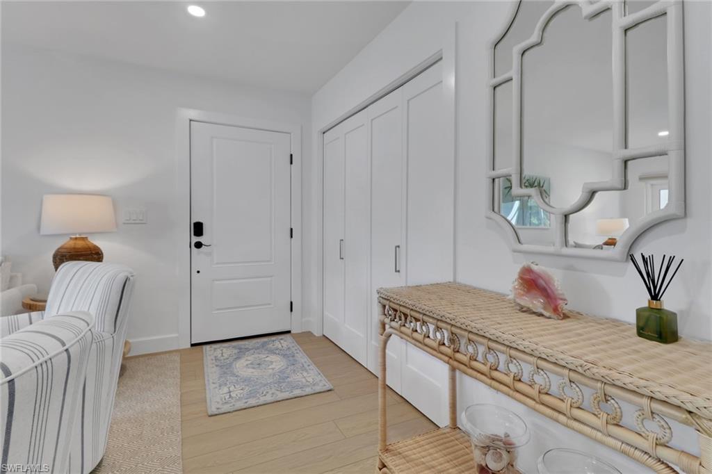 4160 Crayton Road, Unit A4 Naples, FL 34103 - Photo 4 of 23 a bedroom with a bed and window