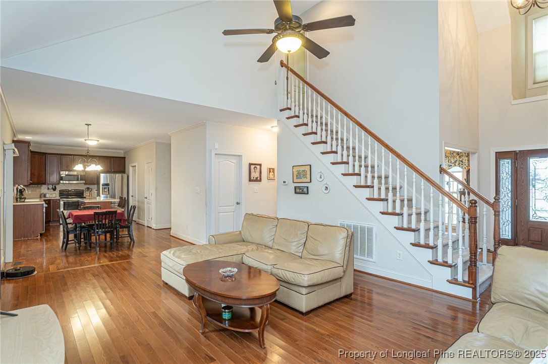 198 Grouse Run Raeford, NC 28376 - Photo 15 of 38 a living room with furniture and a wooden floor