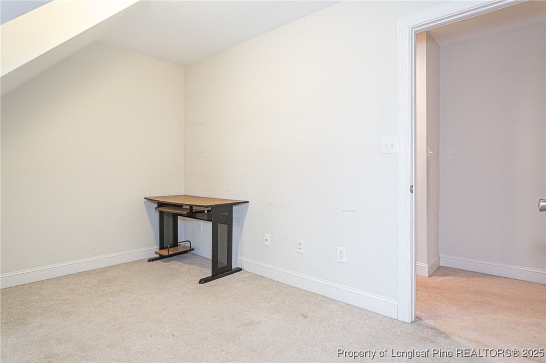 198 Grouse Run Raeford, NC 28376 - Photo 27 of 38 a room with a table and a white wall