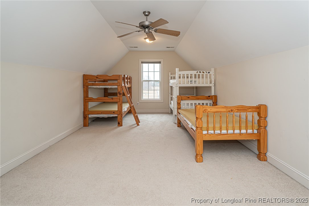 198 Grouse Run Raeford, NC 28376 - Photo 28 of 38 a bedroom with furniture and a window