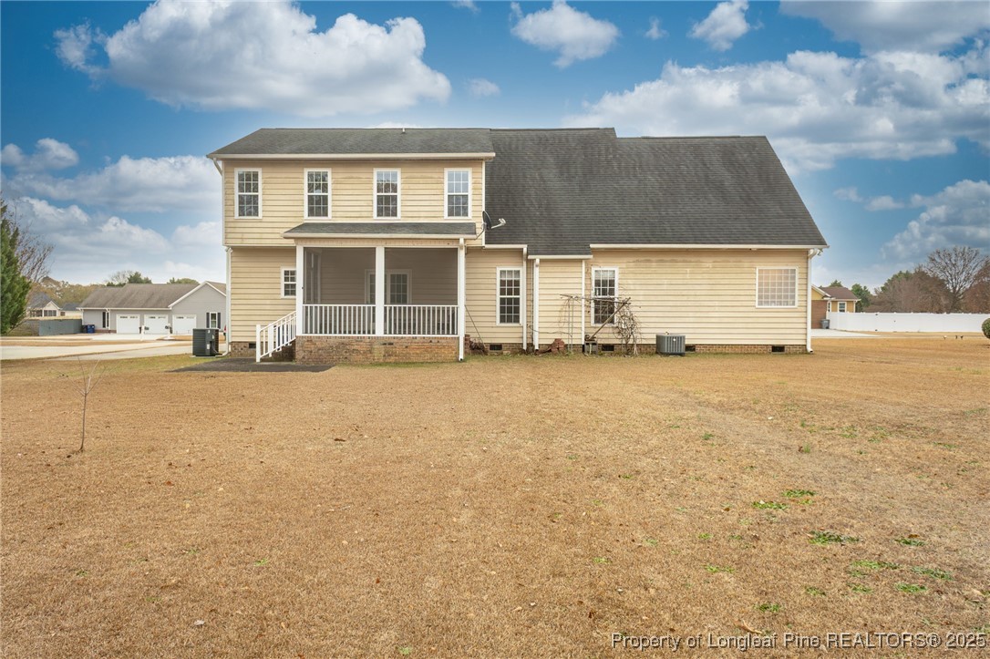198 Grouse Run Raeford, NC 28376 - Photo 7 of 38 a front view of a house with a yard