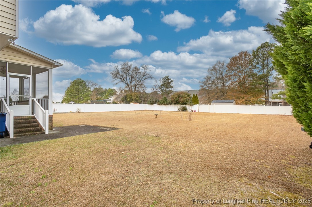 198 Grouse Run Raeford, NC 28376 - Photo 9 of 38 a view of yard with large trees