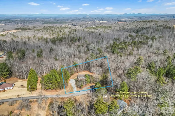 a view of a yard with an ocean