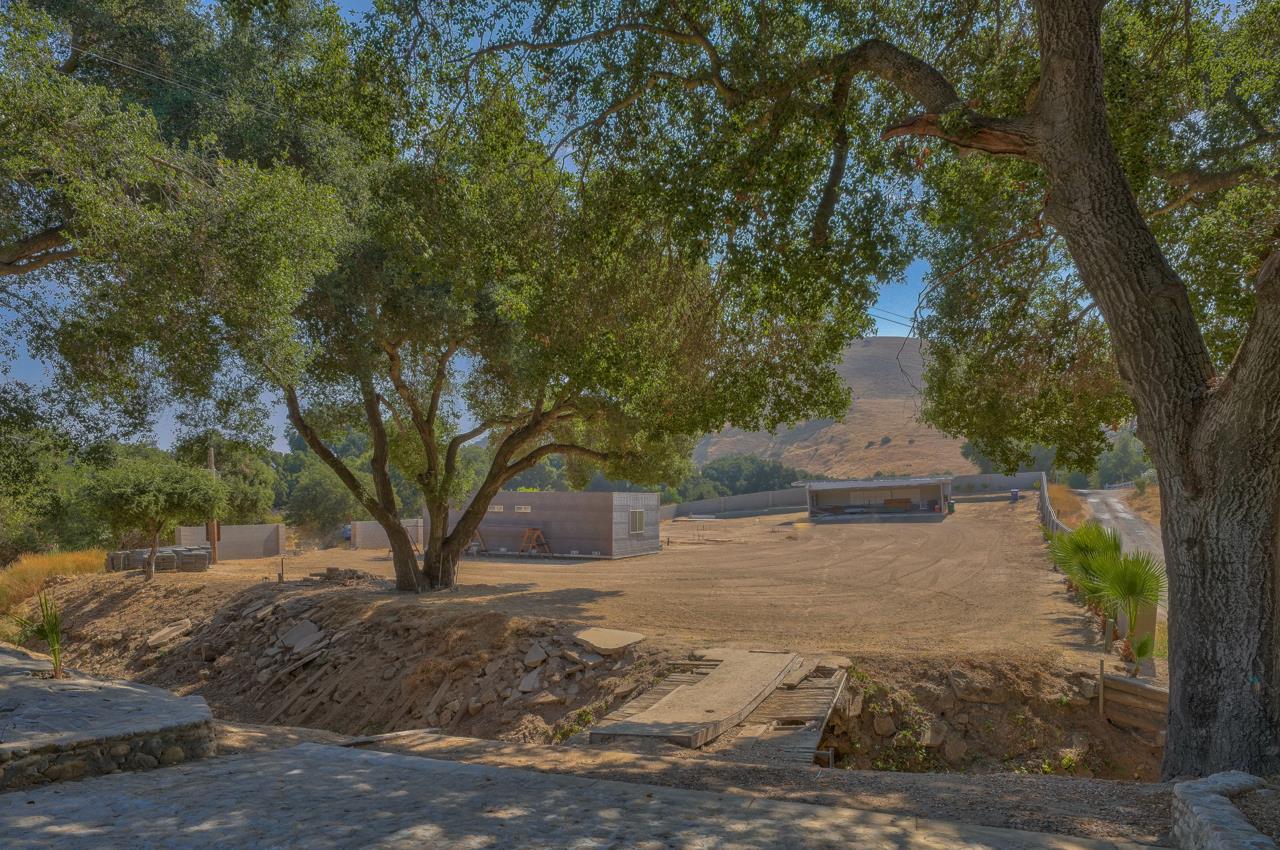 52199 Pine Canyon Road King City, CA 93930 - Photo 3 of 18 a view of a yard with plants and trees