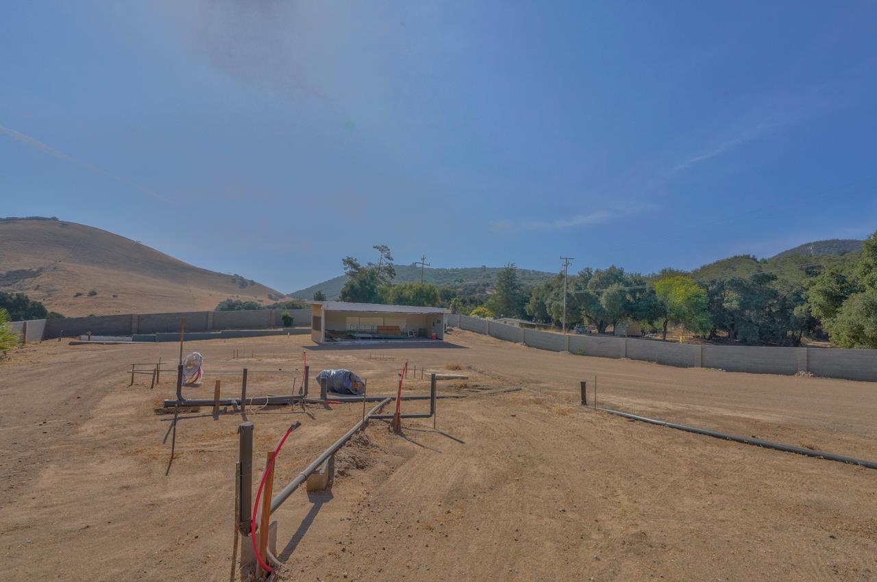 52199 Pine Canyon Road King City, CA 93930 - Photo 7 of 18 a view of a dry yard with wooden fence