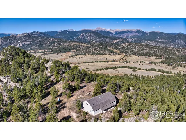 a view of a city with mountain