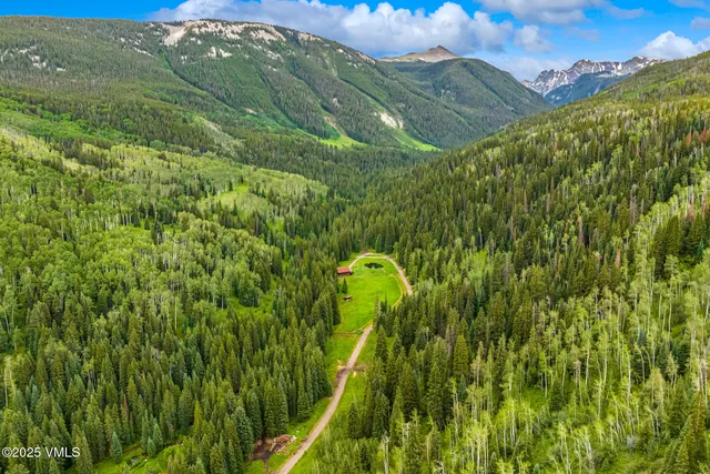 a view of a yard from a balcony