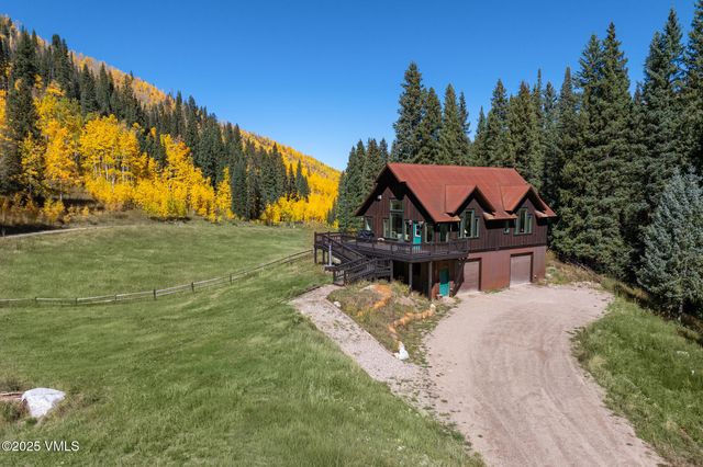 a bathroom with a sink vanity and a mirror