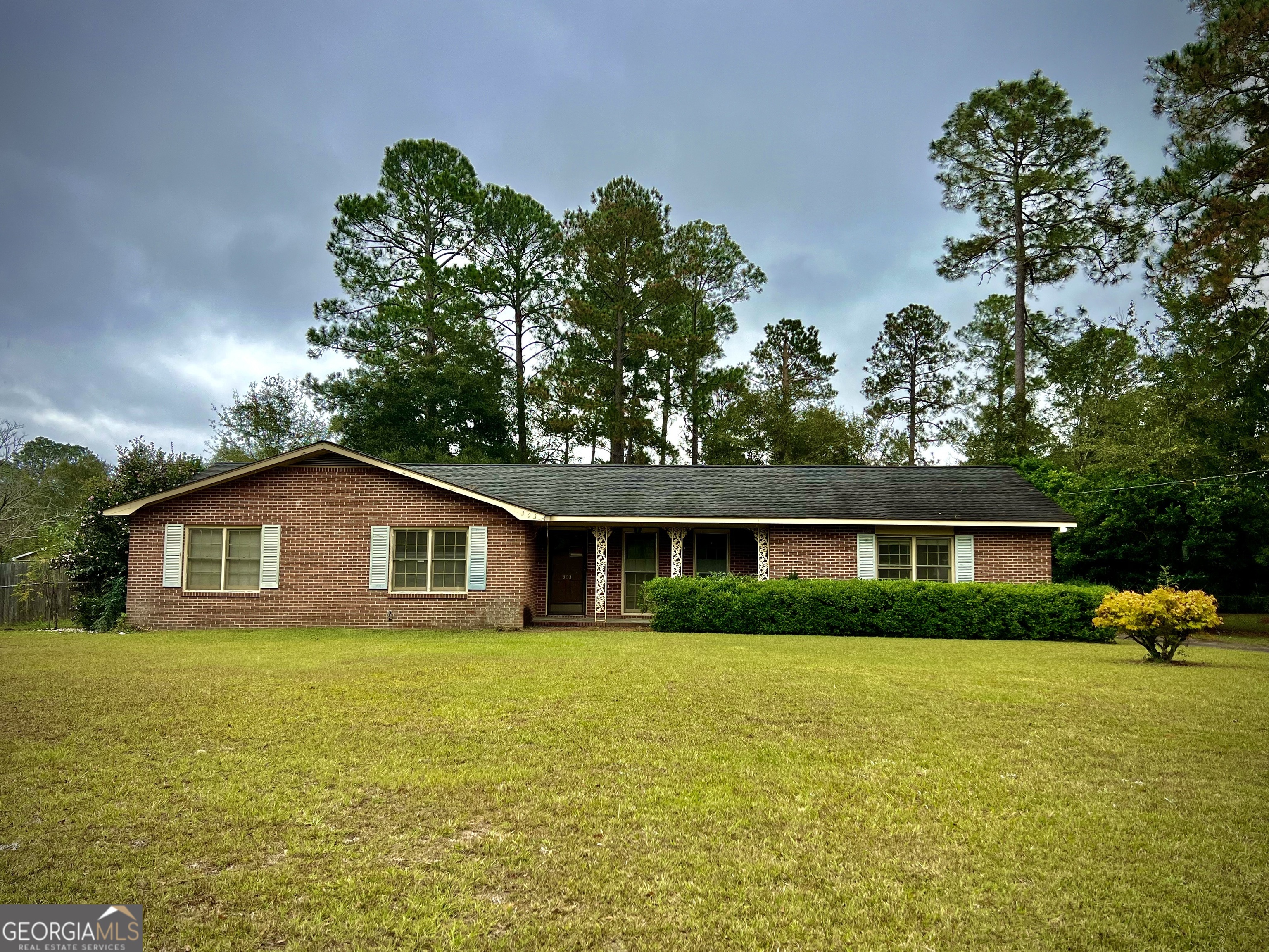 303 Pinehurst Drive Dublin, GA 31021 - Photo 1 of 1 a view of house with a yard