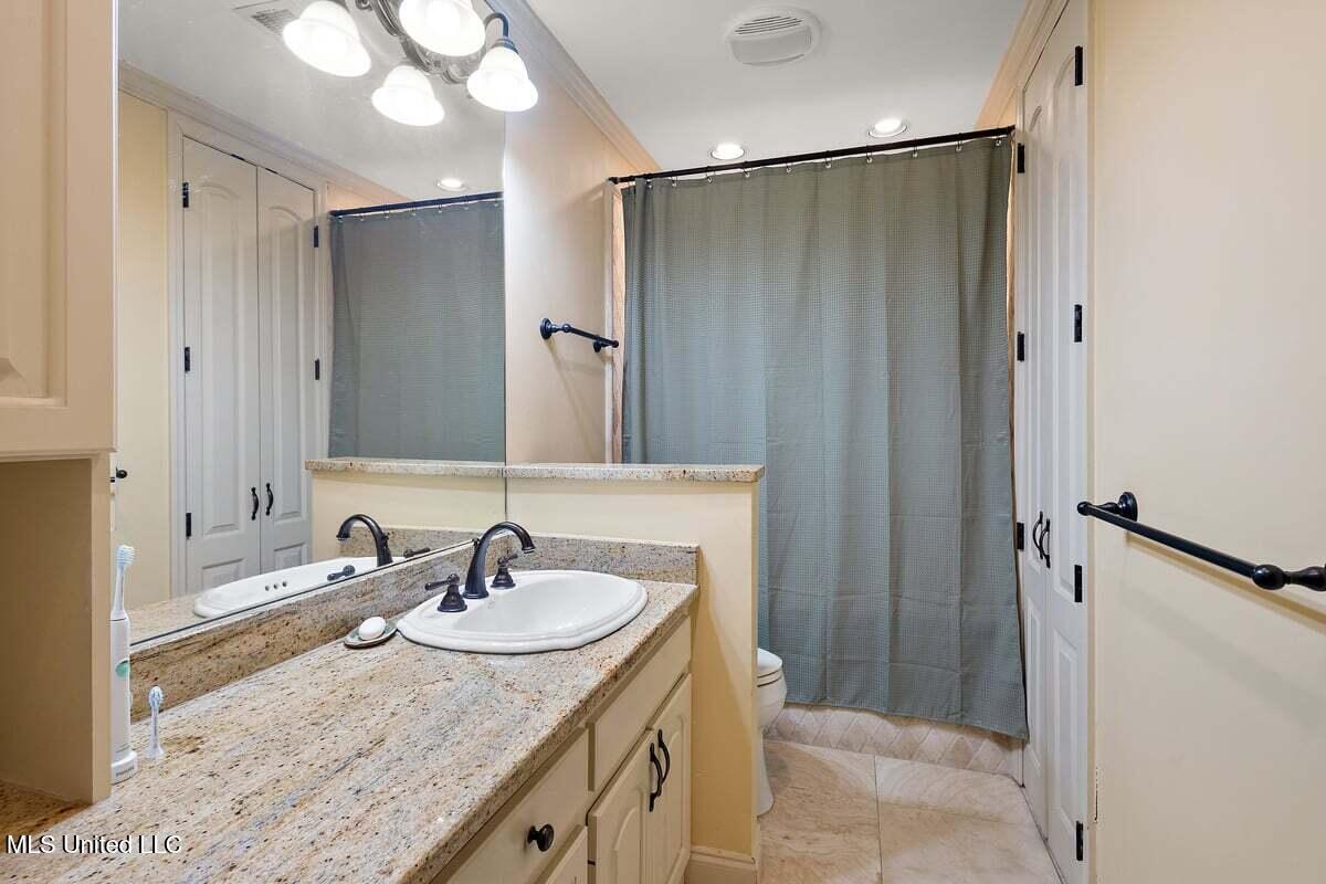 1423 Roxbury Place Jackson, MS 39211 - Photo 19 of 39 Primary downstairs bathroom