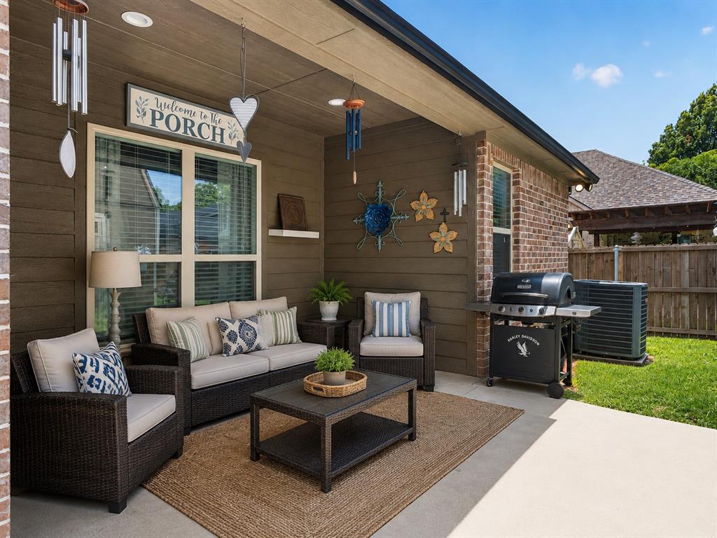 701 West Lamberth Road Sherman, TX 75092 - Photo 30 of 37 Covered patio featuring an outdoor ceiling, recessed lighting, and a large window with blinds