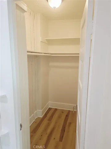 a front view of a house with parking space