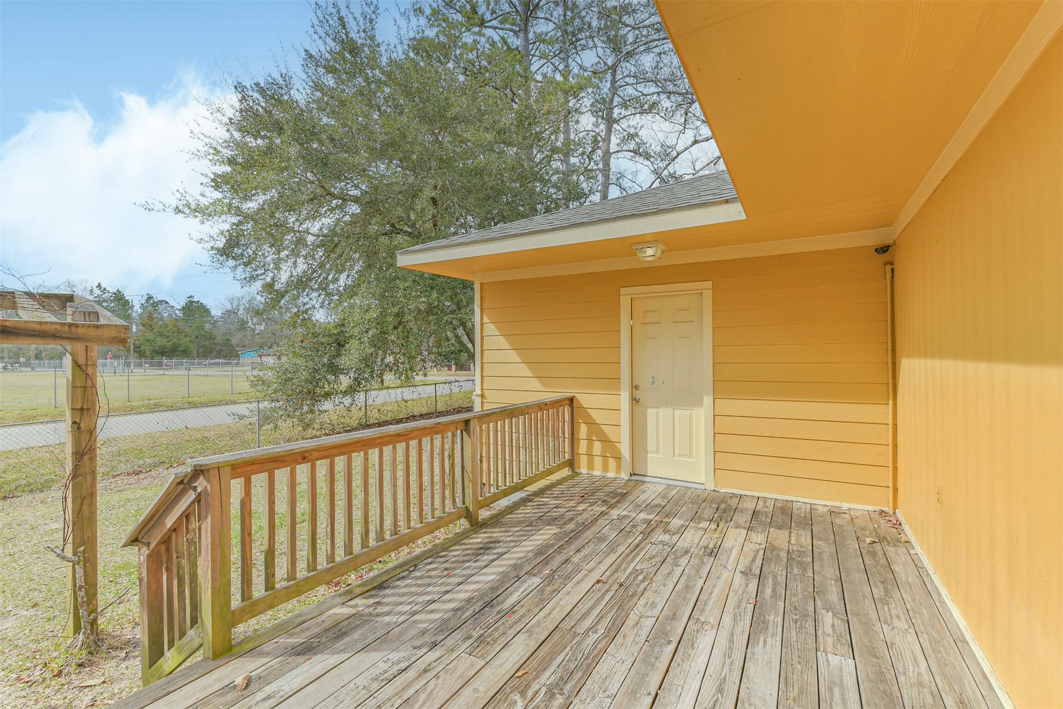 1103 Williams Street Cleveland, TX 77327 - Photo 8 of 32 a view of a two room on the roof deck