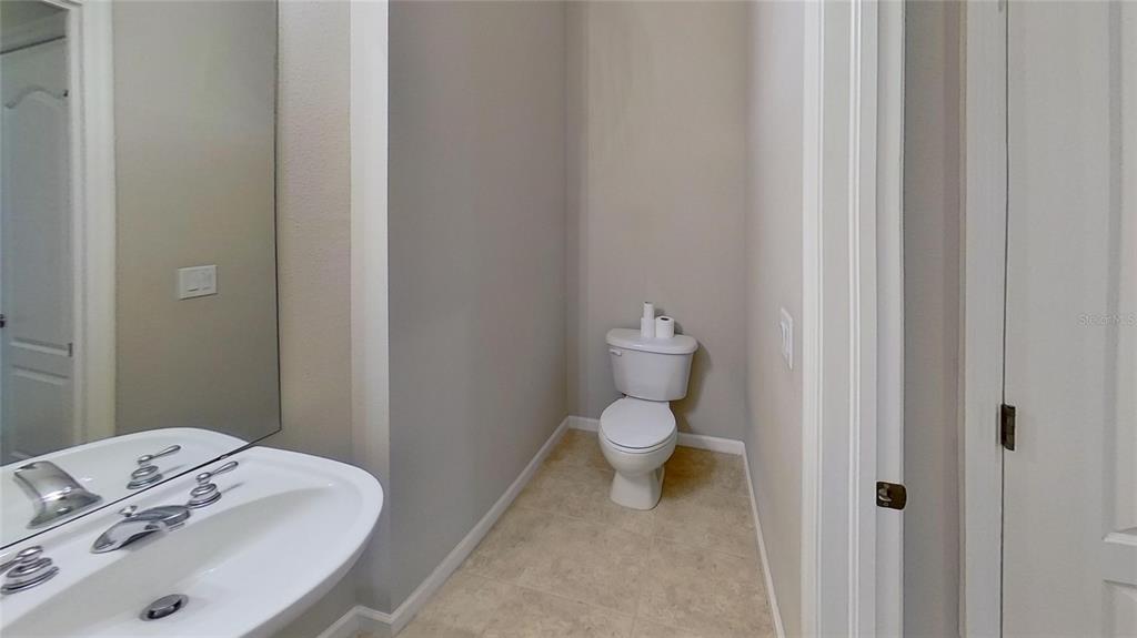 10620 Whittington Court Largo, FL 33771 - Photo 13 of 68 a bathroom with a sink and a toilet