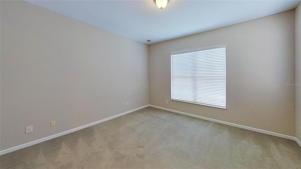 10620 Whittington Court Largo, FL 33771 - Photo 15 of 68 an empty room with a window