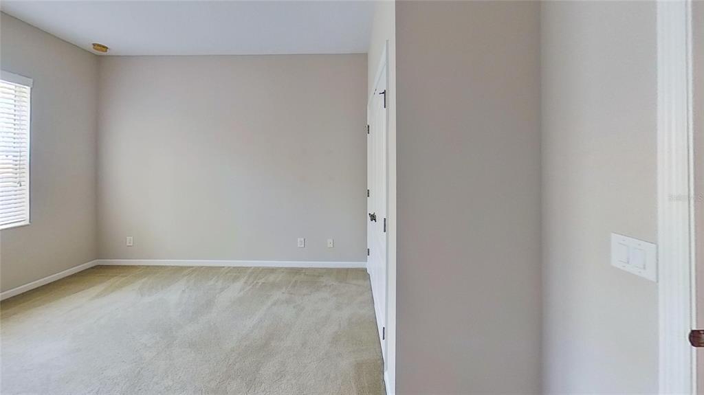 10620 Whittington Court Largo, FL 33771 - Photo 20 of 68 a view of an empty room with a window