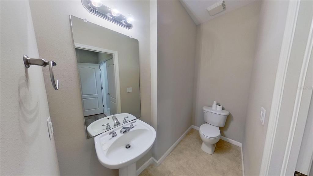 10620 Whittington Court Largo, FL 33771 - Photo 46 of 68 a bathroom with a sink and a mirror