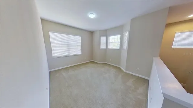 a backyard of a house with lots of green space