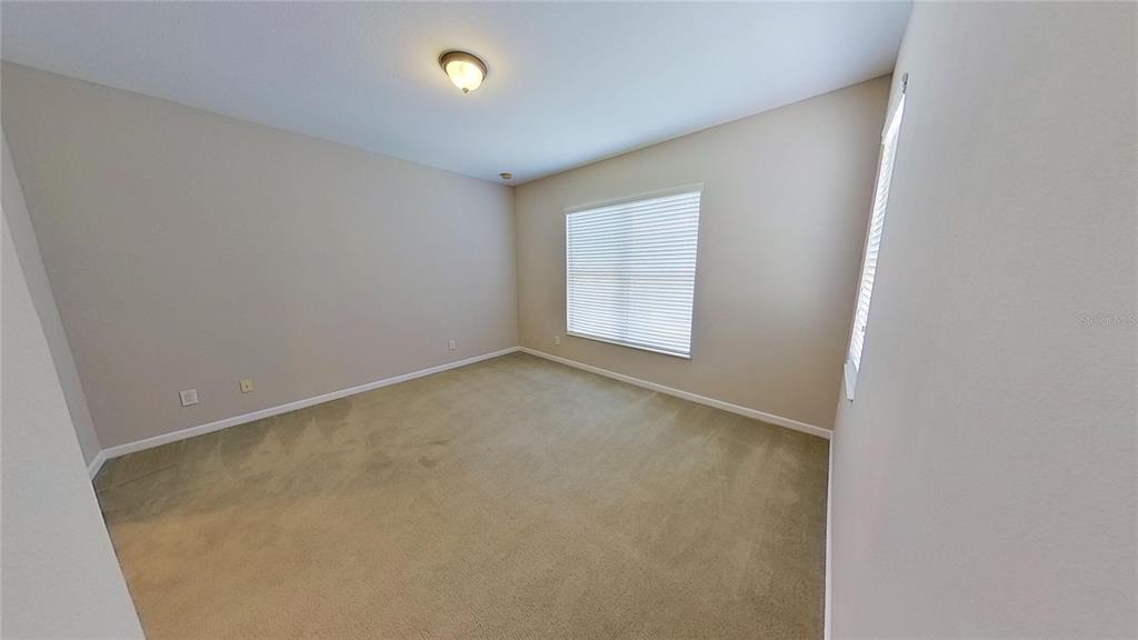 10620 Whittington Court Largo, FL 33771 - Photo 57 of 68 an empty room with windows