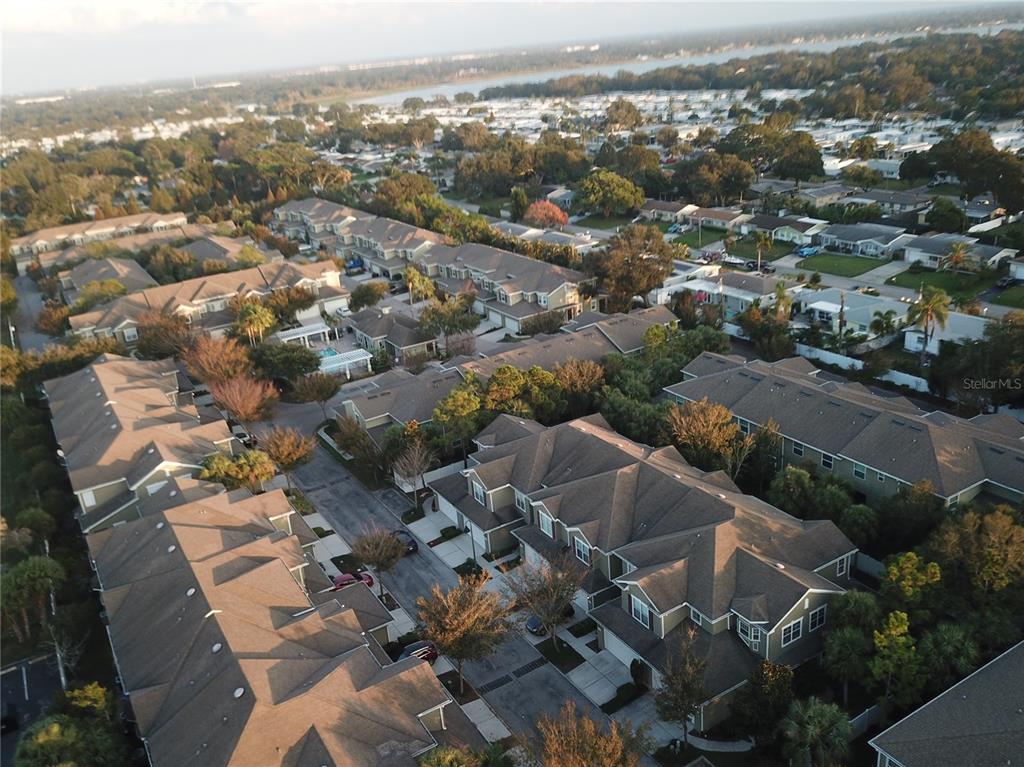 10620 Whittington Court Largo, FL 33771 - Photo 62 of 68 an aerial view of residential houses with city view