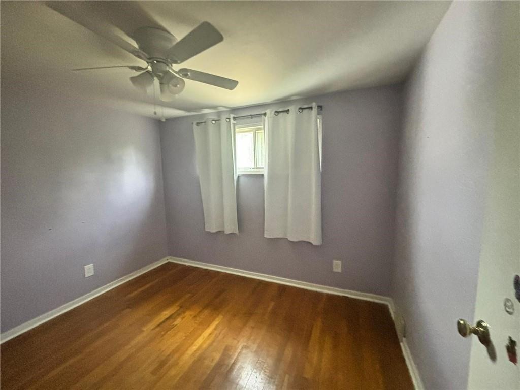 270 Wheeler Avenue McKees Rocks, PA 15136 - Photo 12 of 28 wooden floor in an empty room