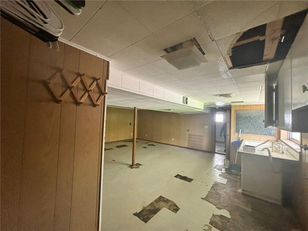 270 Wheeler Avenue McKees Rocks, PA 15136 - Photo 15 of 28 a bathroom with a shower and a sink