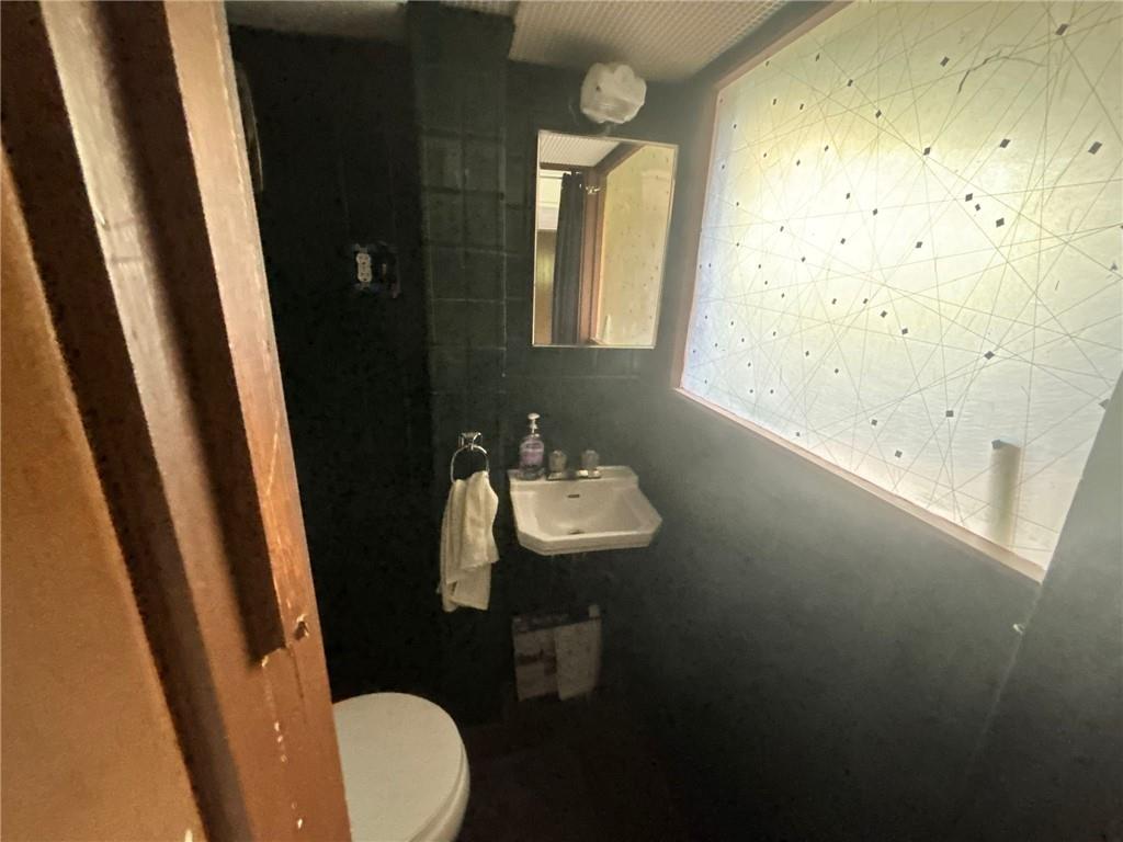 270 Wheeler Avenue McKees Rocks, PA 15136 - Photo 20 of 28 a bathroom with a sink and toilet