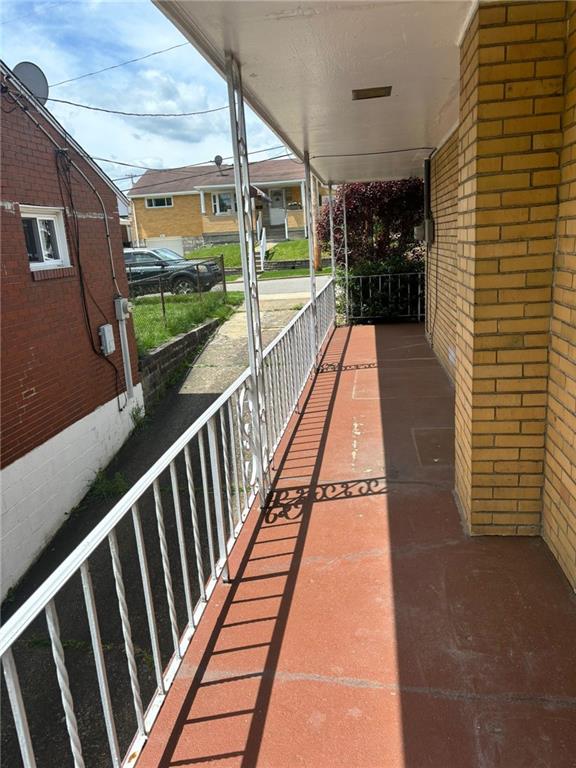 270 Wheeler Avenue McKees Rocks, PA 15136 - Photo 22 of 28 a view of balcony with wooden floor and stairs