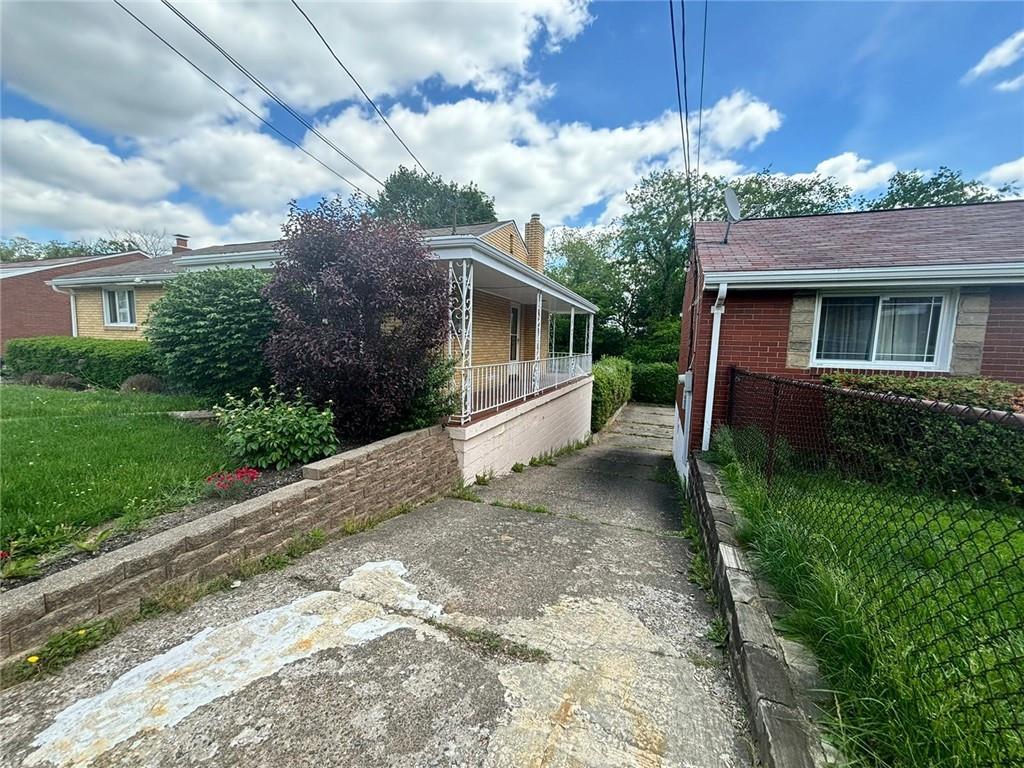 270 Wheeler Avenue McKees Rocks, PA 15136 - Photo 27 of 28 a view of a house with a yard