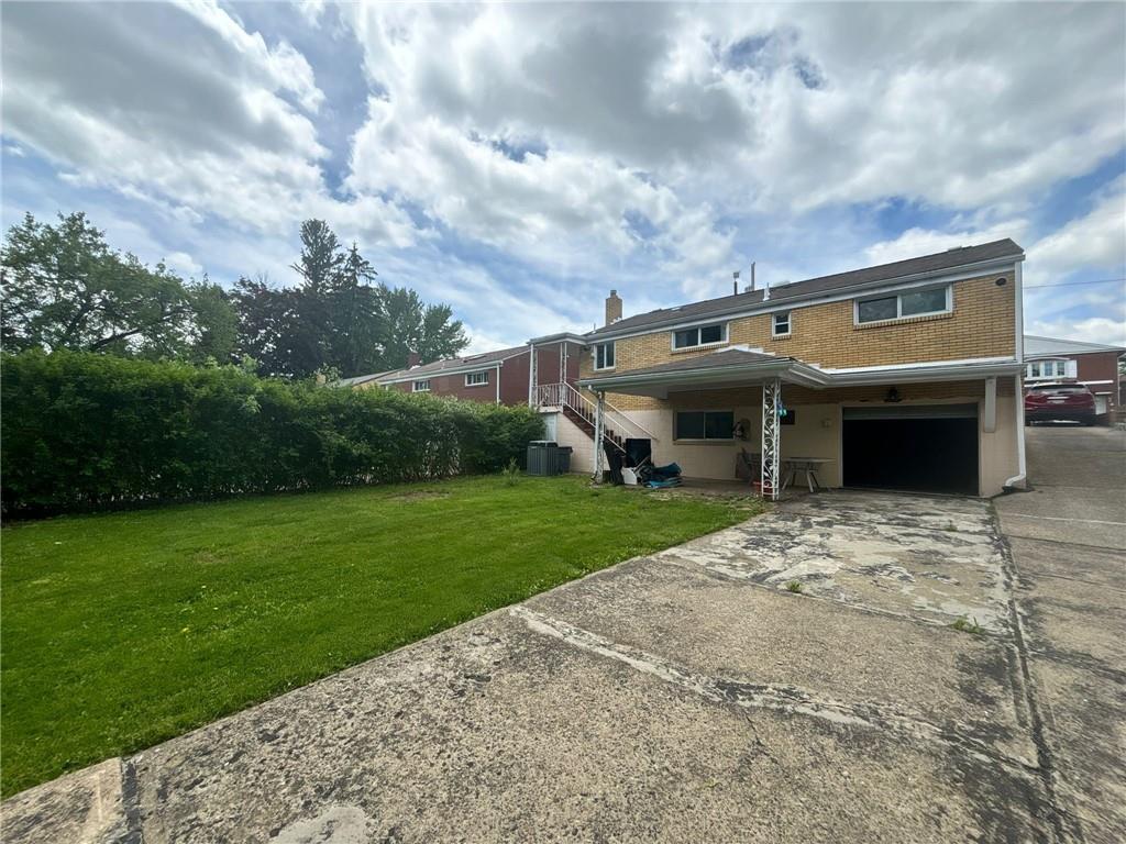 270 Wheeler Avenue McKees Rocks, PA 15136 - Photo 28 of 28 a front view of a house with garden